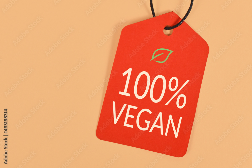 Red label with text '100% Vegan'
