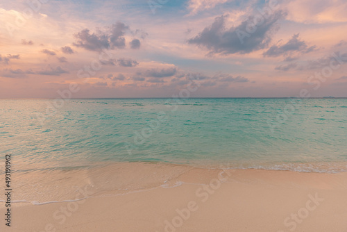 Dream sunset calm sea shore. Seaside of tropical beach landscape, exotic ocean horizon, relax inspirational, motivational nature scenic with colorful sky, closeup sand. Tranquil summer outdoor scenic