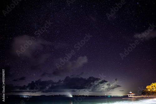 night landscape overlooking the sea with starry sky 