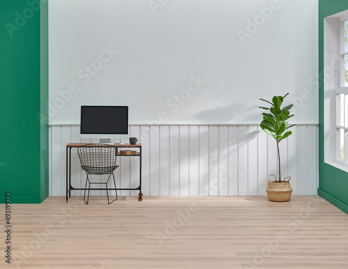Fototapeta Naklejka Na Ścianę i Meble -  Wall and background room home house style, white and green concept, working table computer lamp vase of plant.