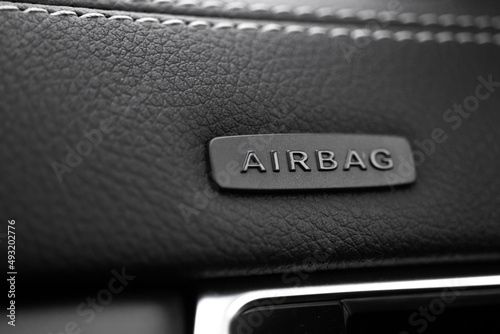 Safety airbag sign on car, luxury sport car interior background photo