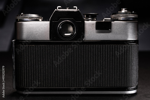 Old film camera on a dark background