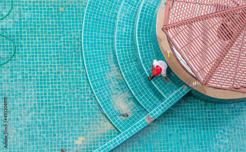 Renovation, maintenance, repair, and tiling work of a swimming pool	