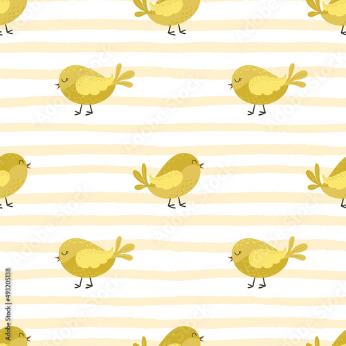 Seamless pattern with cute cartoon yellow birds, chickens. Little chicks on a yellow striped textured background. For Easter wrapping paper and children's textiles. Color vector illustration