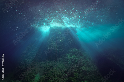Beautiful and magic underwater photo of rays of light