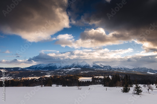 Winter view of the High Tatras from the surrounding fields. Photo taken during the golden hour