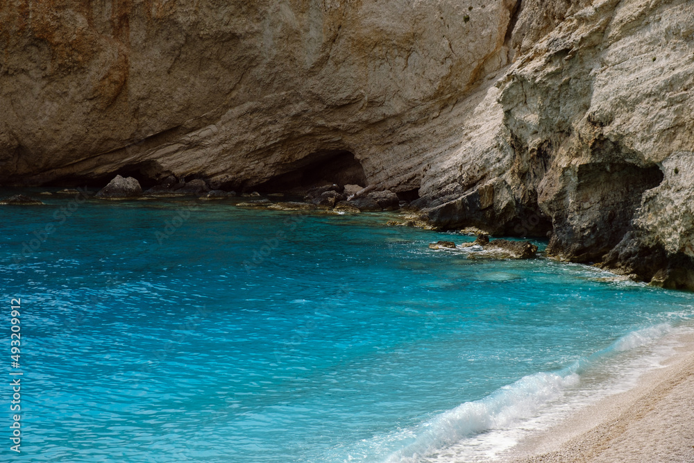 Beach with azure sea and rock cliffs. Beach with azure sea and rock cliffs.