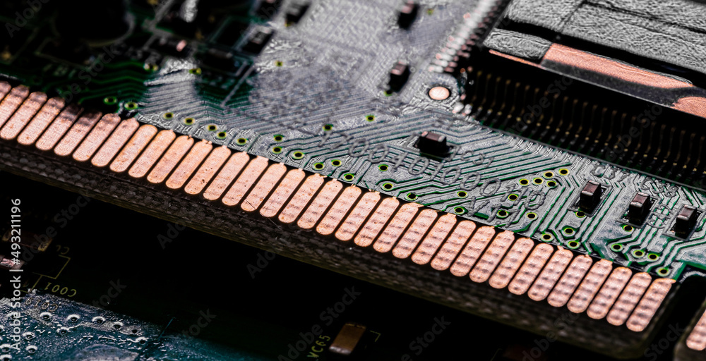 Close up of components and microchips on PC circuit board. Close up of components and microchips on PC circuit board.