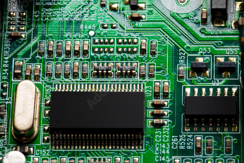 Fototapeta Naklejka Na Ścianę i Meble -  Close up of components and microchips on PC circuit board.