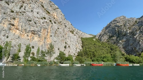 Crystal clear river Cetina and tunnel in Croatia mountains