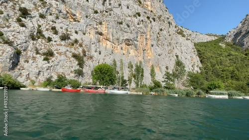 Crystal clear river Cetina many kayaks in Croatia 