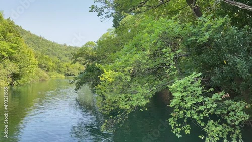 Crystal clear river Cetina in Croatia wide angle 