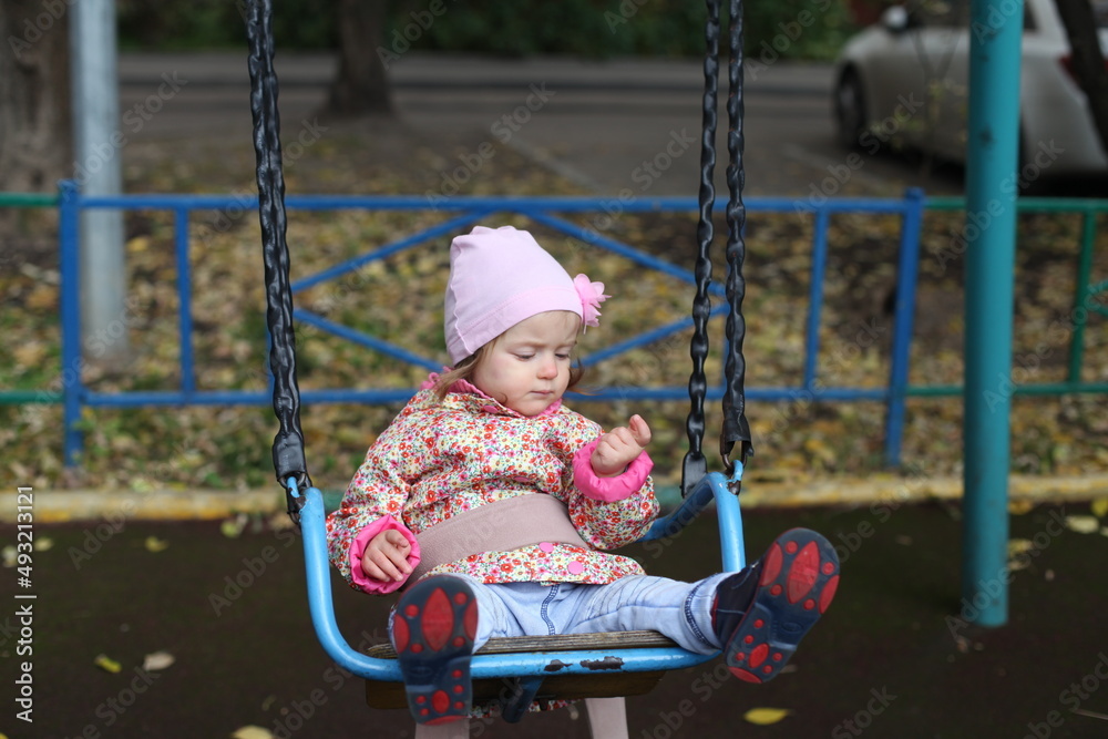 Portrait of little girl playing outdoors. Autumn Portrait of little girl playing outdoors. Autumn