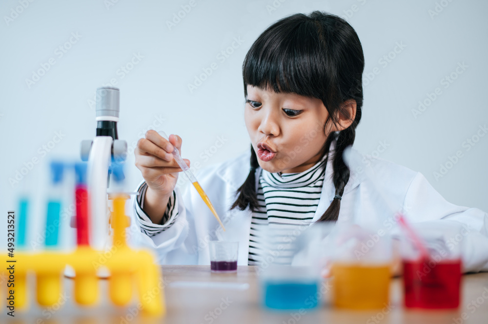 girls doing science experiments in the lab girls doing science experiments in the lab