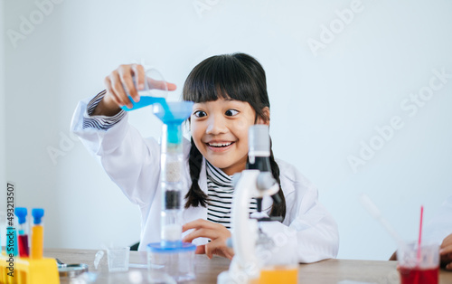 girls doing science experiments in the lab