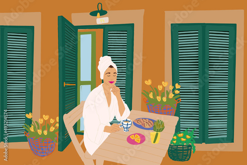 Beautiful woman in bathrobe and towel on her head having a breakfast with coffee and croissants, sitting by the table at terrace near the hotel or house. Vector illustration