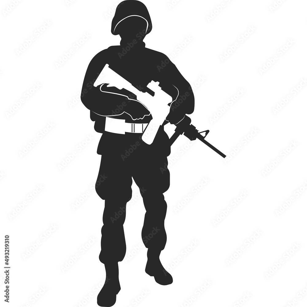 A military man with a gun in his hands. A military man with a gun in his hands.