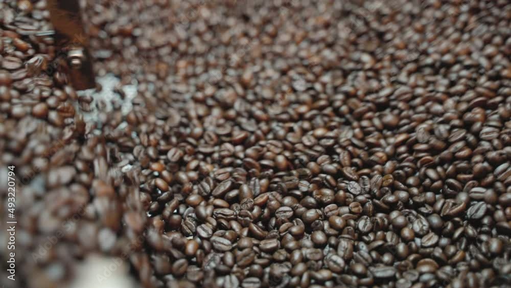 Coffee roaster, coffee beans that are roasted from the oven to ripen and ready for further drinking
