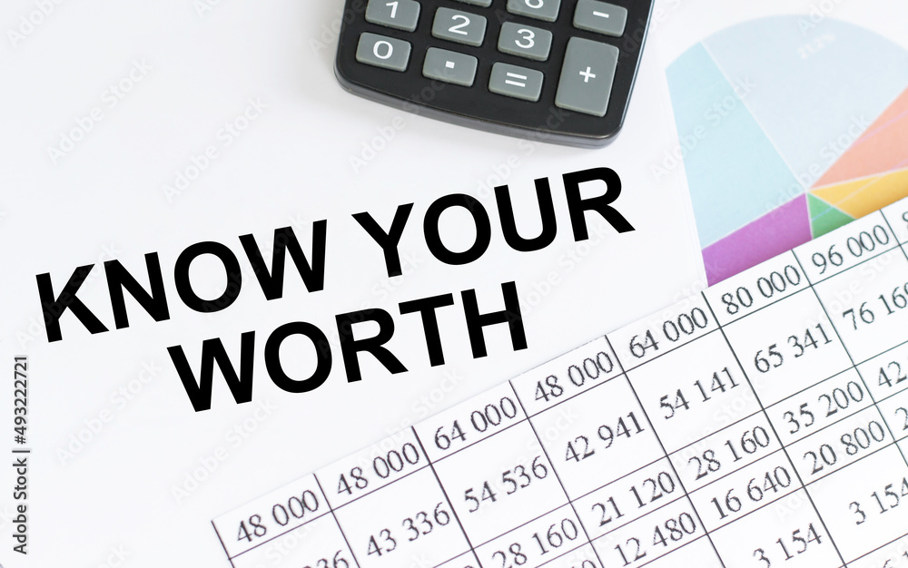 Know your worth, the text is written in a notebook next to reports, calculator Know your worth, the text is written in a notebook next to reports, calculator