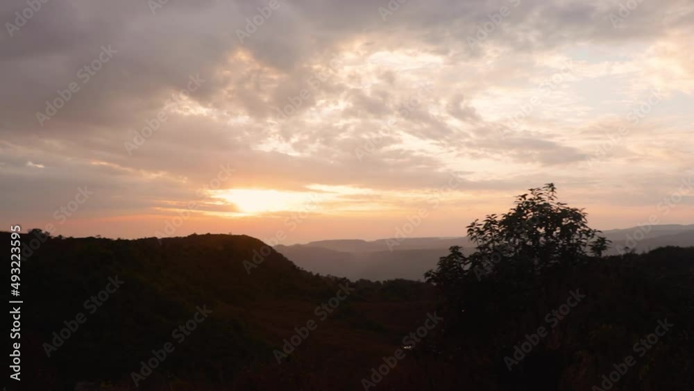 sunset dramatic orange sky with mountain shadow at morning from flat angle sunset dramatic orange sky with mountain shadow at morning from flat angle