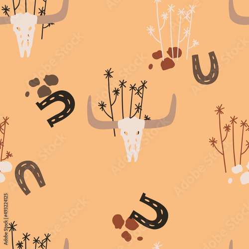 seamless pattern with horseshoe bull skulls. desert. vector illustration for fabric, paper packaging and other
