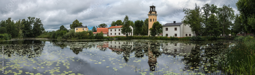Forsmark, Osthammar - Sweden -  Reflections of the vintage village in a small pond