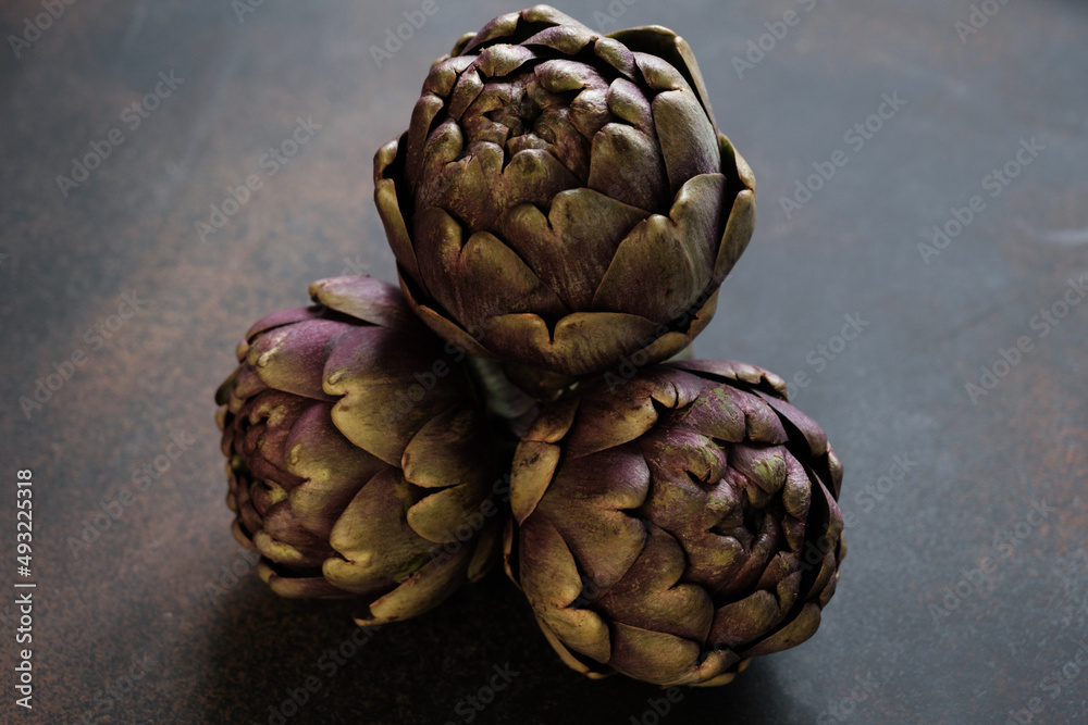 The globe artichoke is a variety of a species of thistle cultivated as a food..The edible portion of the plant consists of the flower buds. The globe artichoke is a variety of a species of thistle cultivated as a food..The edible portion of the plant consists of the flower buds.
