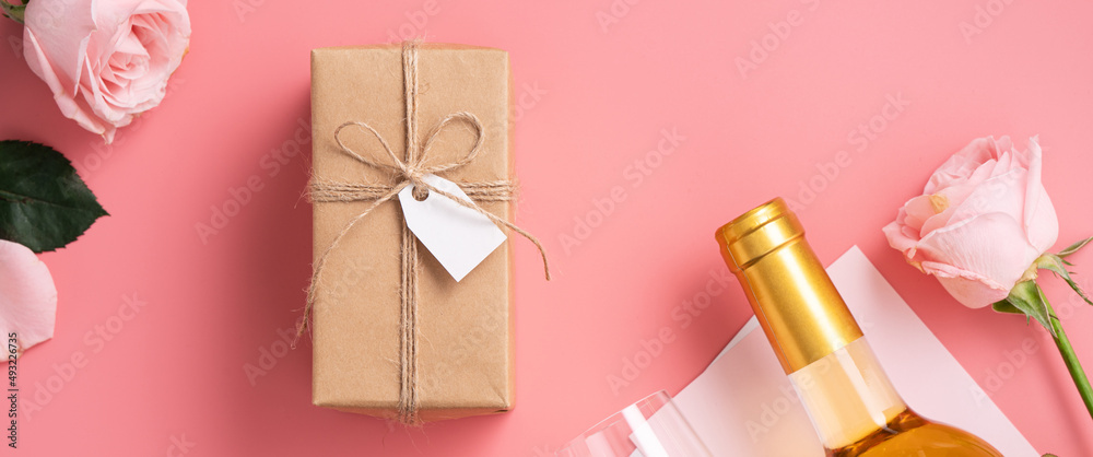Mother's Day sending gift and meal design concept background with pink rose flower on pink background.