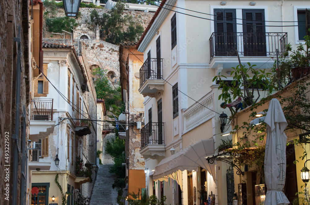 Cozy european street with houses and stairs in old town Nafplio, Greece