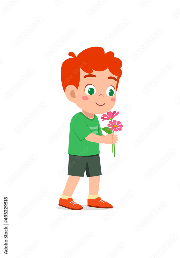 little boy holding flower and sniff the scent little boy holding flower and sniff the scent