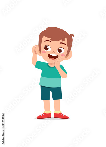 little boy standing and try to hear sound
