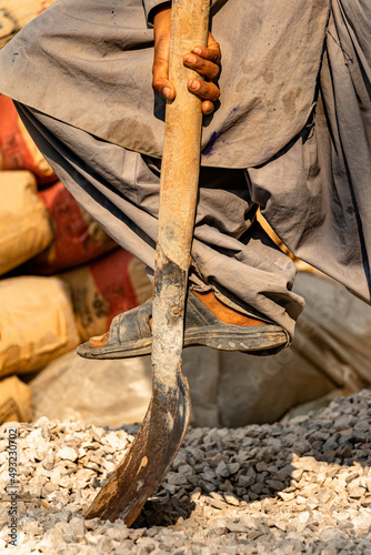 Poor children are forced to work construction
