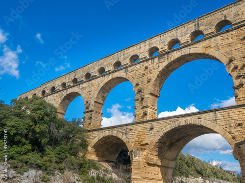 The magnificent Pont du Gard  an ancient Roman aqueduct bridge  Vers-Pont-du-Gard in southern France. Built in the first century AD to carry water to the Roman colony of Nemausus  N  mes 