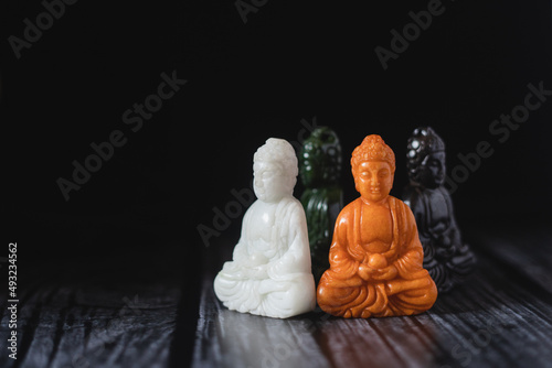 Photography Dark photo carved jade buddhas