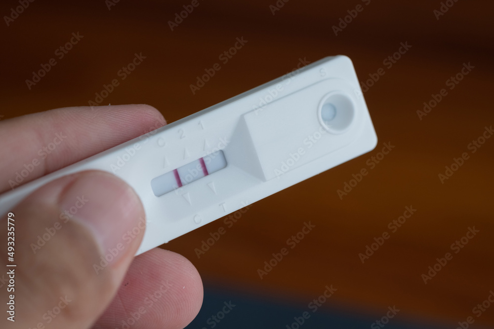 covid-19 positive test result with antigen rapid test kit (ATK), The test showed a positive result covid-19 positive test result with antigen rapid test kit (ATK), The test showed a positive result