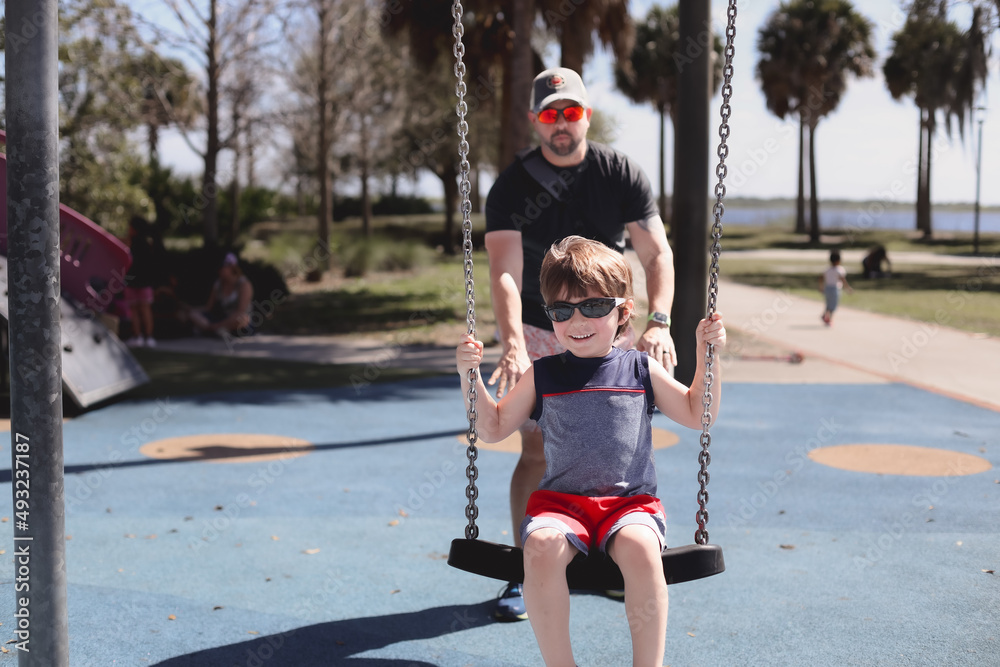 Kissimmee Lakefront Park Grassy waterfront park with walking paths, a