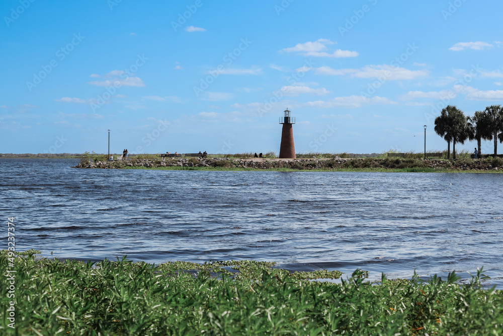 Kissimmee Lakefront Park Grassy waterfront park with walking paths, a