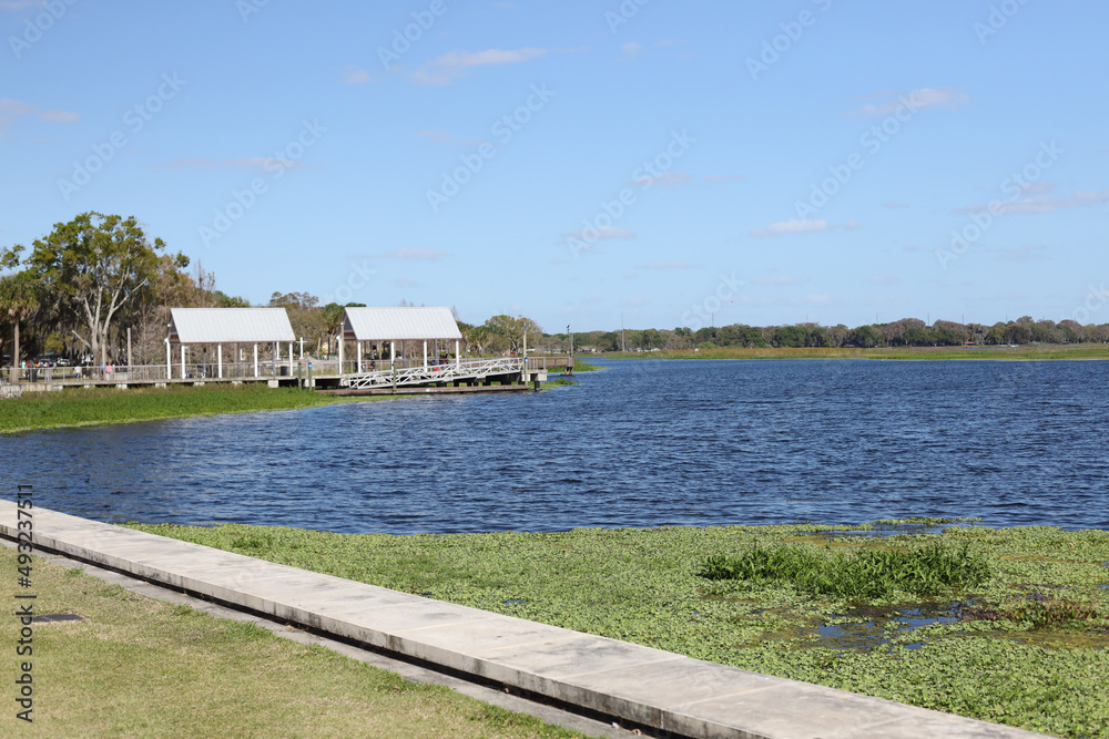 Kissimmee Lakefront Park Grassy waterfront park with walking paths, a