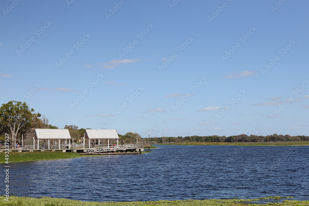 Kissimmee Lakefront Park Grassy waterfront park with walking paths, a