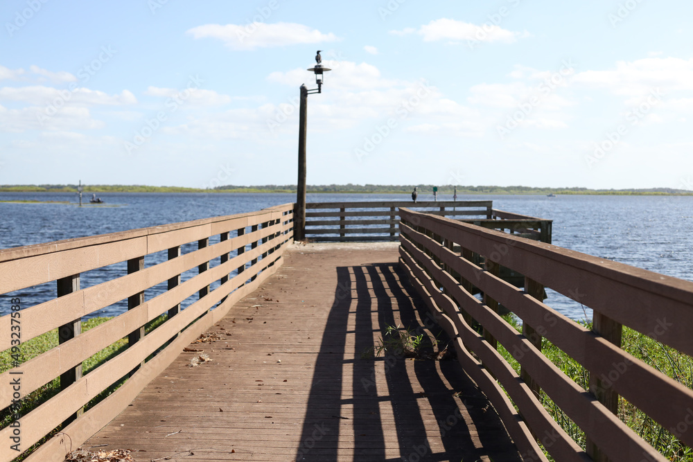 Kissimmee Lakefront Park Grassy waterfront park with walking paths, a