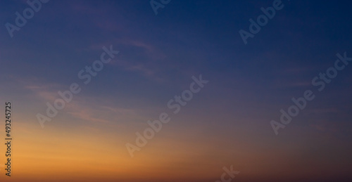 Evening sky with colorful orange sunset clouds on twilight, Dusk sky background