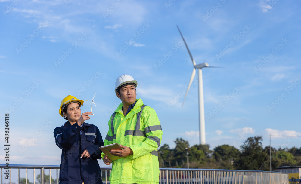 Engineers analysis windmill engineers inspection and progress check wind turbine. Engineers analysis windmill engineers inspection and progress check wind turbine.