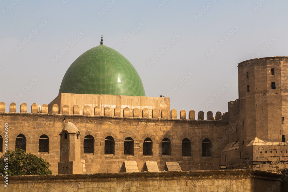 Cairo, Egypt - January 2022: Dom, walls and a tower of Suleyman Pasha mosque at Salah El-Din Al-Ayoubi citadel 