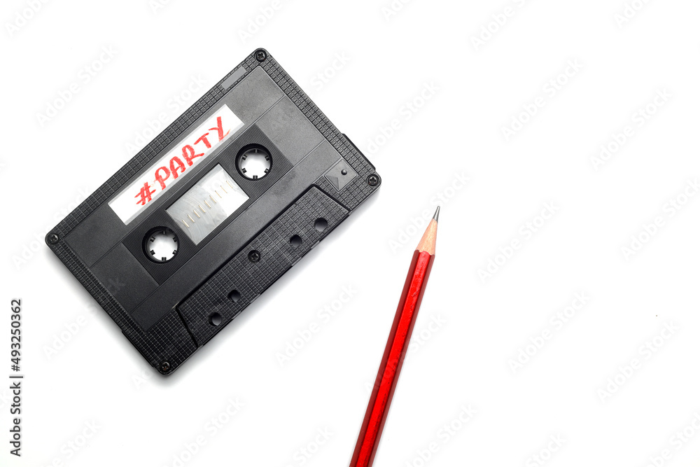 Obraz premium A pen for rewind cassette tape compact retro on white background. 90's concepts. 