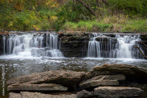 Beautiful fall leaves surround waterfall runoff at Waterfall Glen Forest Preserve, Dupage County, IL. photo
