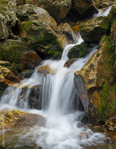 Fototapeta Naklejka Na Ścianę i Meble -  Autumn at the Aitzondo waterfall, Aiako Harriak Natural Park, Euskadi