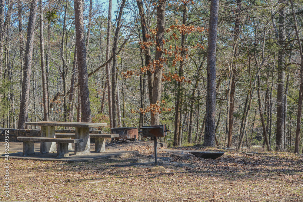 Picnic and camping spot in the forest of Beavers Bend State Park at Broken Bow, Oklahoma Picnic and camping spot in the forest of Beavers Bend State Park at Broken Bow, Oklahoma
