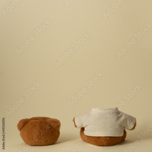 Headless teddy bear toy on minimal background symbolizing anxiety, pressure, sadness and breakdown.