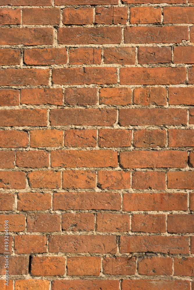 Old red brick wall texture. Background of a old brick house. Old red brick wall texture. Background of a old brick house.