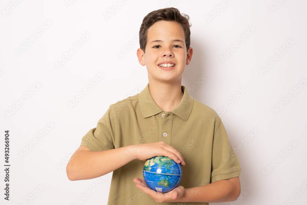 Happy boy holding globe in hands - isolated on white background. Ecological concept. Happy boy holding globe in hands - isolated on white background. Ecological concept.